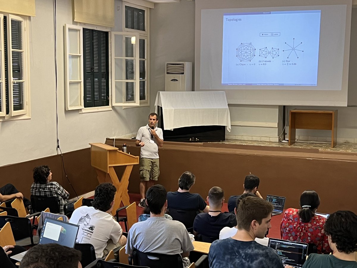 PBlockchainLab's tweet photo. Day 4 of the #MEGA_ACE Summer School: Esteban Mocscos (U of Buenos Aires) on systems-driven blockchain research. @AlgoFoundation @PurdueCS @csatrpi @coinfabrik @TAMUECE https://t.co/Tcz5AjlOXd