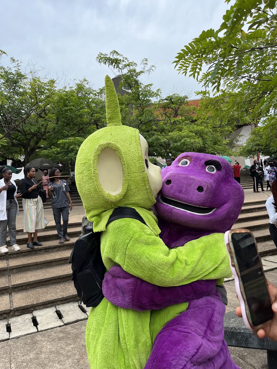 loluwa_o's tweet photo. I went as Barney for my FYB costume day and met the love of my life😂🤭 https://t.co/IEWoqtdHa3
