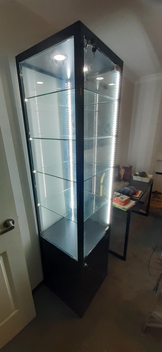 Upgrade your office or retail space with our sleek and modern frameless glass cabinets! Our cabinets are customizable and designed to meet your specific needs. #glasscabinets #officedecor #retaildisplays 

This is assembly job finished this week.