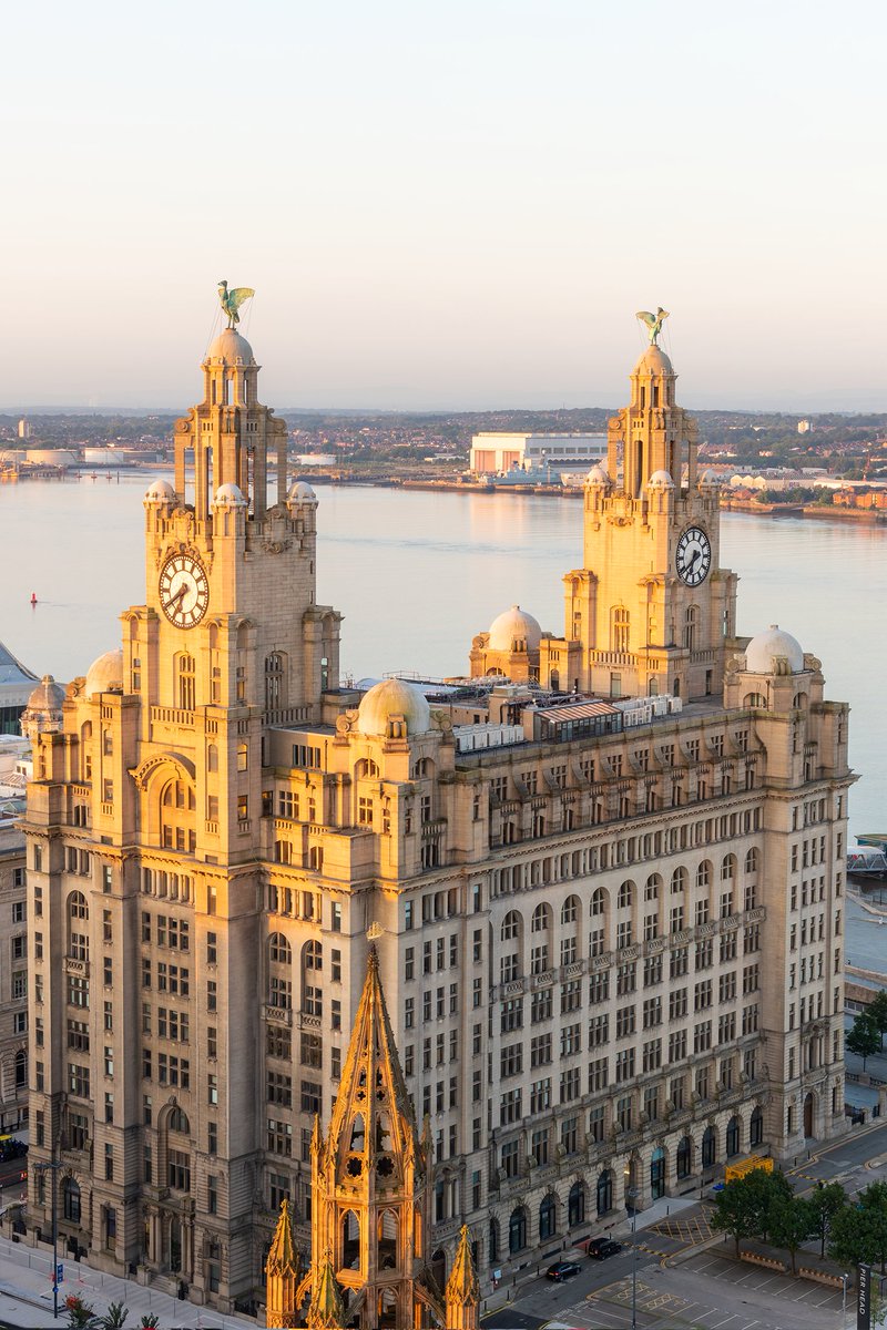 Royal Liver Building, #Liverpool and the spire of St Nick's Church in the early morning sunshine.