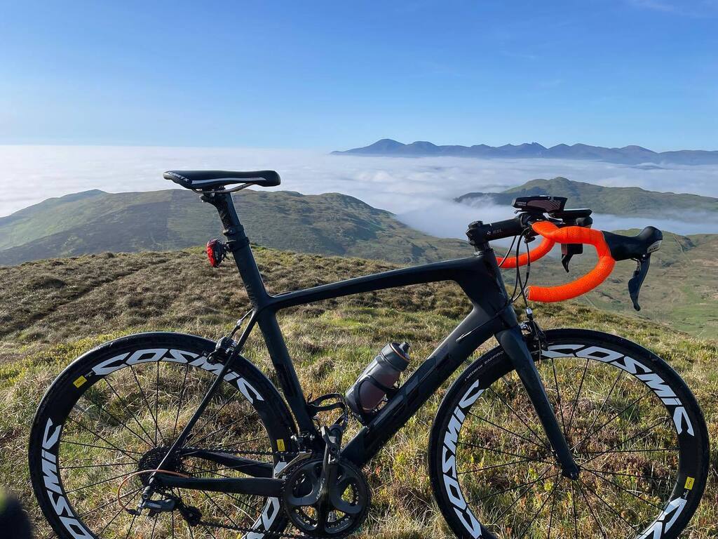 What a view 🙌 | Slieve Croob looking towards the Mournes. I could’ve spent hours taking in the breathtaking scenery. Unreal. 

.
.
.
#lifebehindbars
#velo
#ciclismo
#stravaphoto
#whereiroll 
#outsideisfree
#pedallingsquares
#whereiride
#roadslikethes… instagr.am/p/CsL0L39ItCd/