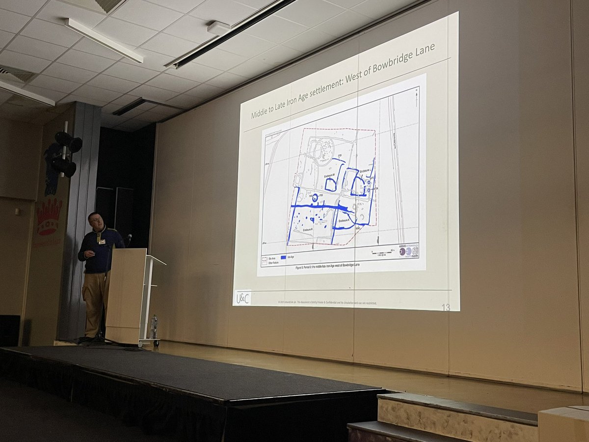 Adam Tinsley with <a href="/oatweet/">Oxford Archaeology</a> regaling the room with the mammoth works from Newark and the phased #Neolithic to #Roman archaeology within. Don’t worry, there are plenty of Bronze Age and Iron Age features too!