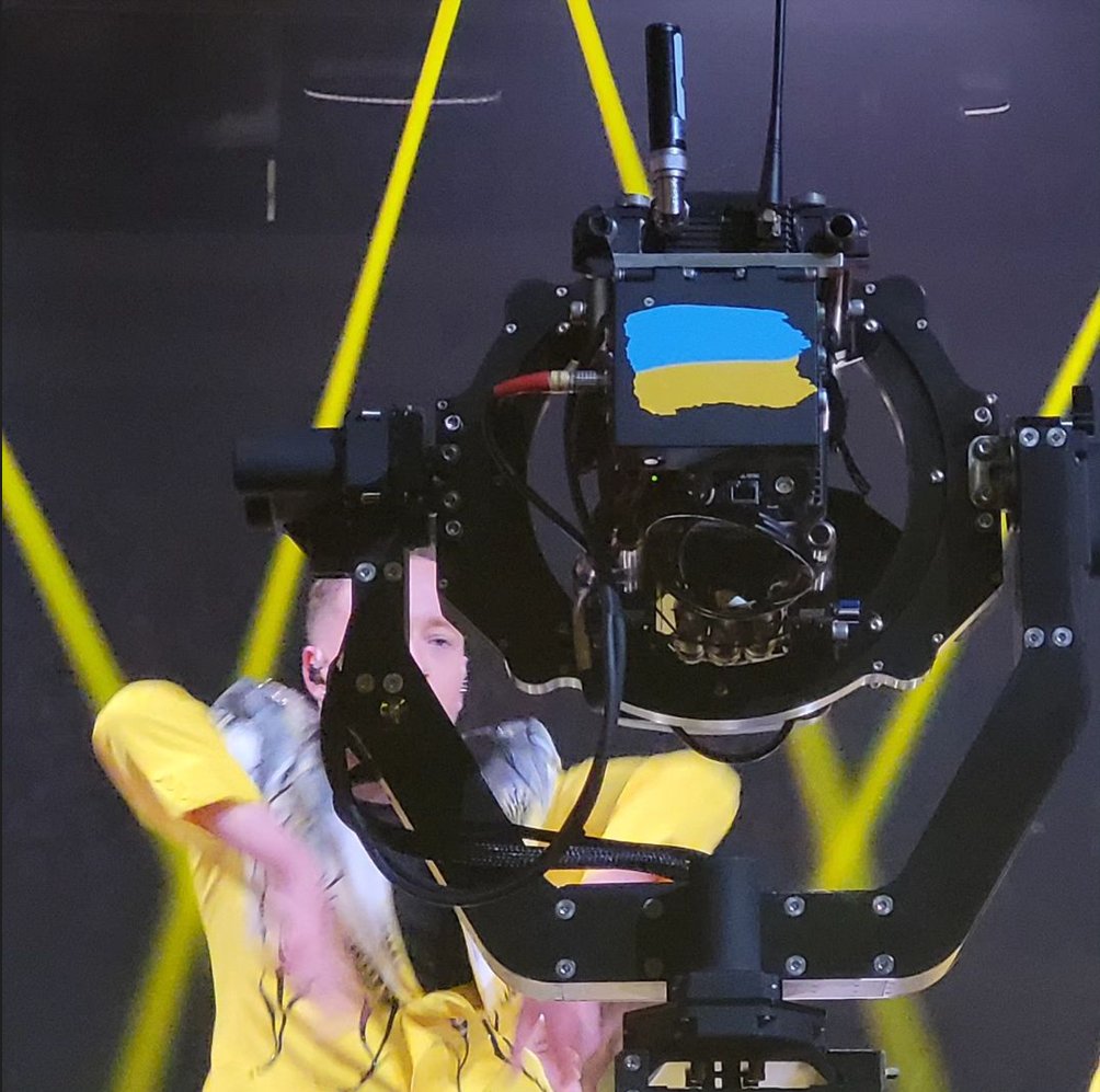 The contest might not be in Ukraine, but there's a hell of a lot of Ukraine in the contest. 

All special cameras; 5 rails, 2 Moviebirds, and 1 2D Cable camera, were supplied and operated by OperTec TV from Ukraine.

They're long time #Eurovision partners.