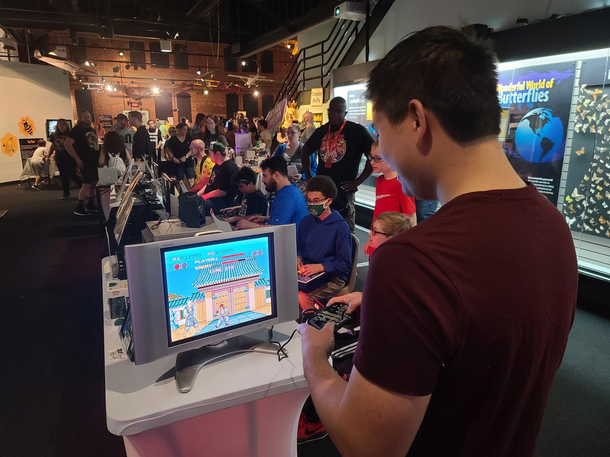 evaction's tweet photo. Punches and pollinators at the @SyracusePunch History of #StreetFighter area at @RetroGameCon Jr. at the @MOSTSyracuse #fightinggames #retrogaming #videogamecon #videogames https://t.co/fXDThaXFlq