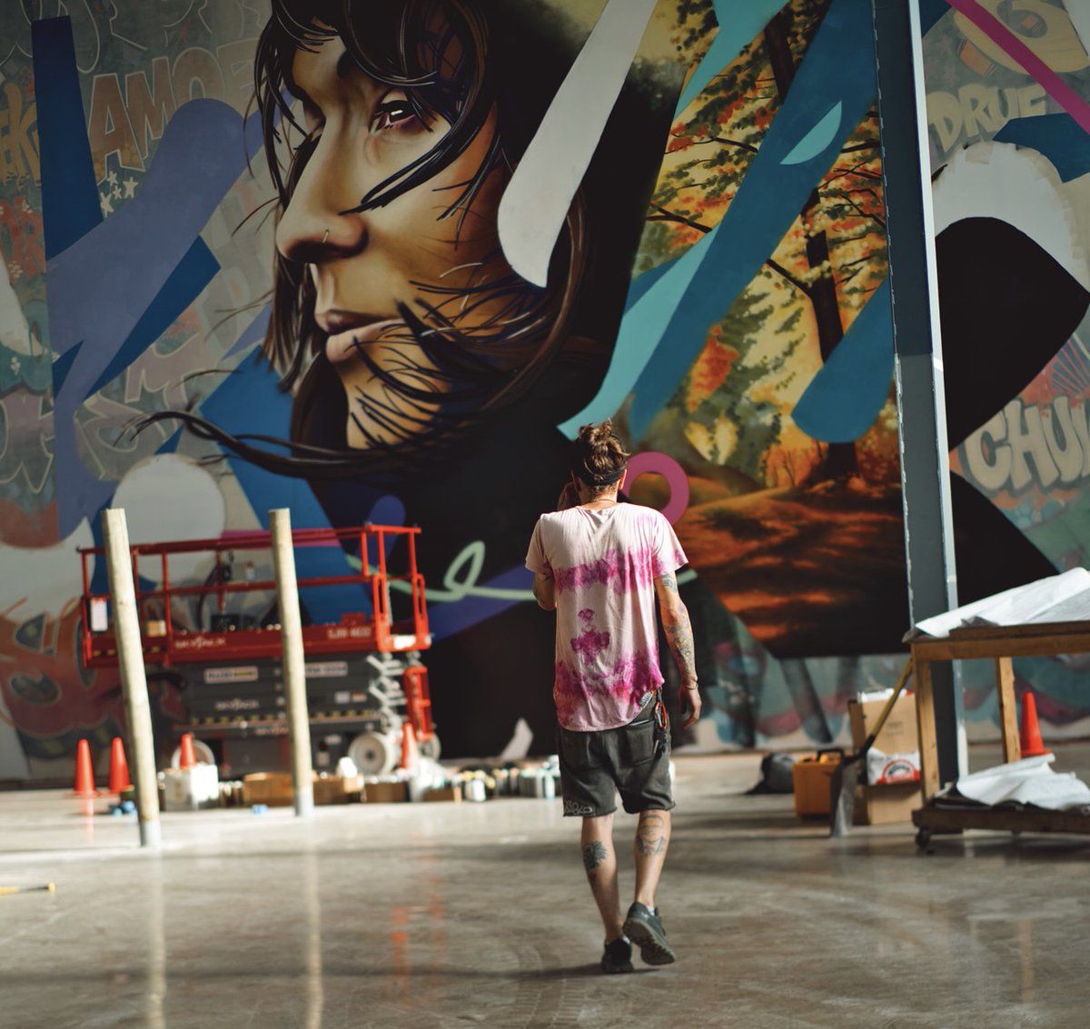 I am “Wetiko”- a mural and fine artist based out of Detroit, Michigan. Mostly known for my brightly colored hand painted photo collages, I have built a career around many visual styles.