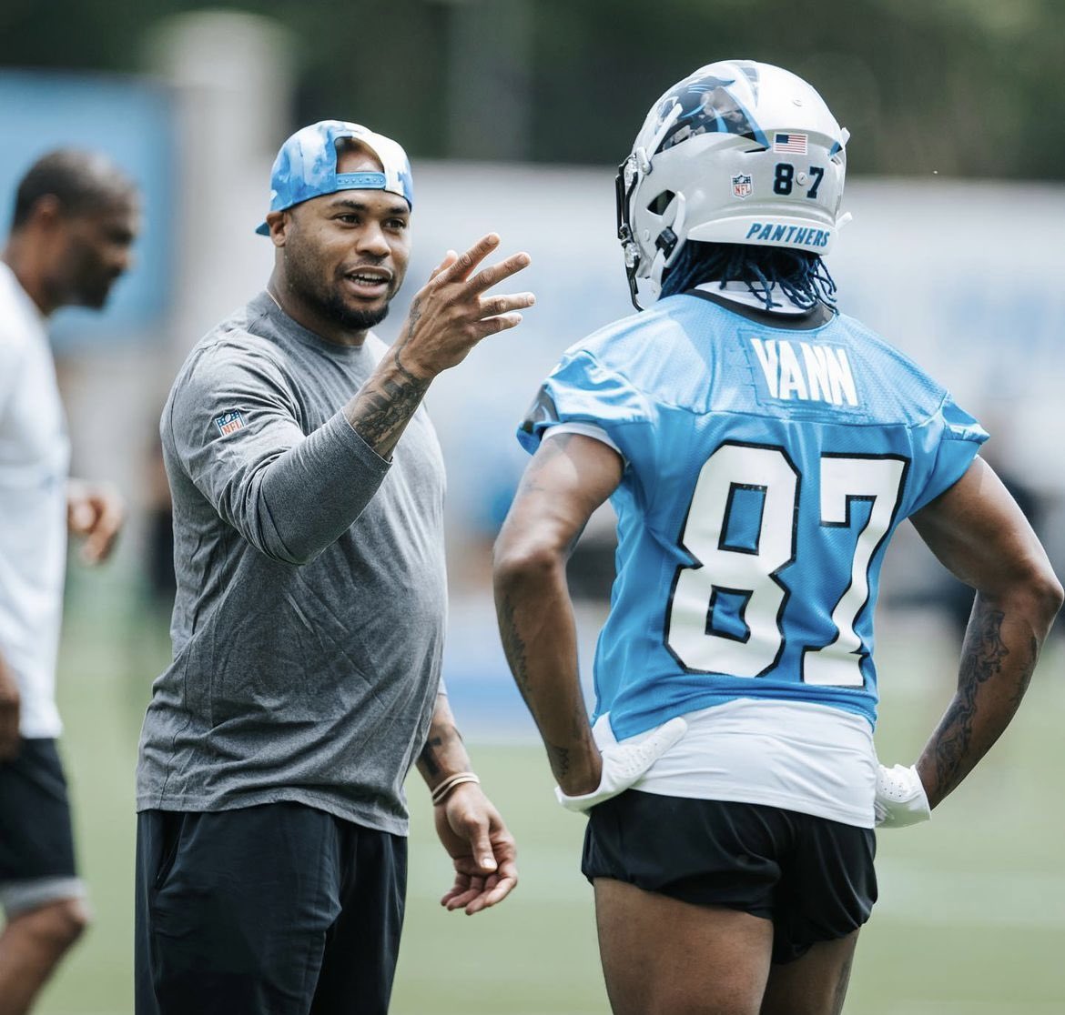 Josh Vann getting some advice from Carolina Panthers legend @SteveSmithSr89. 📸: @JoshVann_