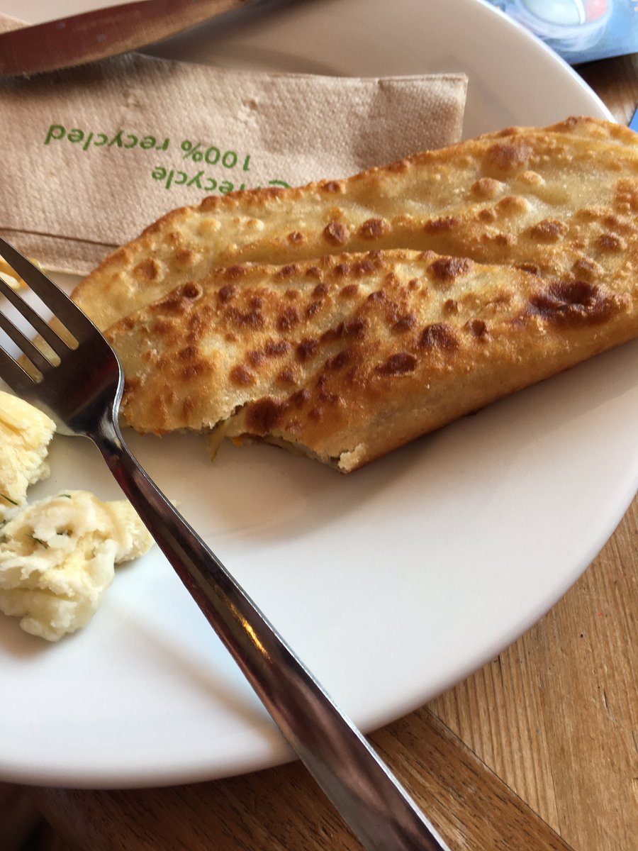 NikkiLMann's tweet photo. @strategywoman I had the joy of trying some delicious Ukrainian food today made by some of our local friends - Varenyk and Chebureki - both delicious. No coffee with it as it is very warm today so sparkling apple juice instead. https://t.co/ypzvtcqMQM