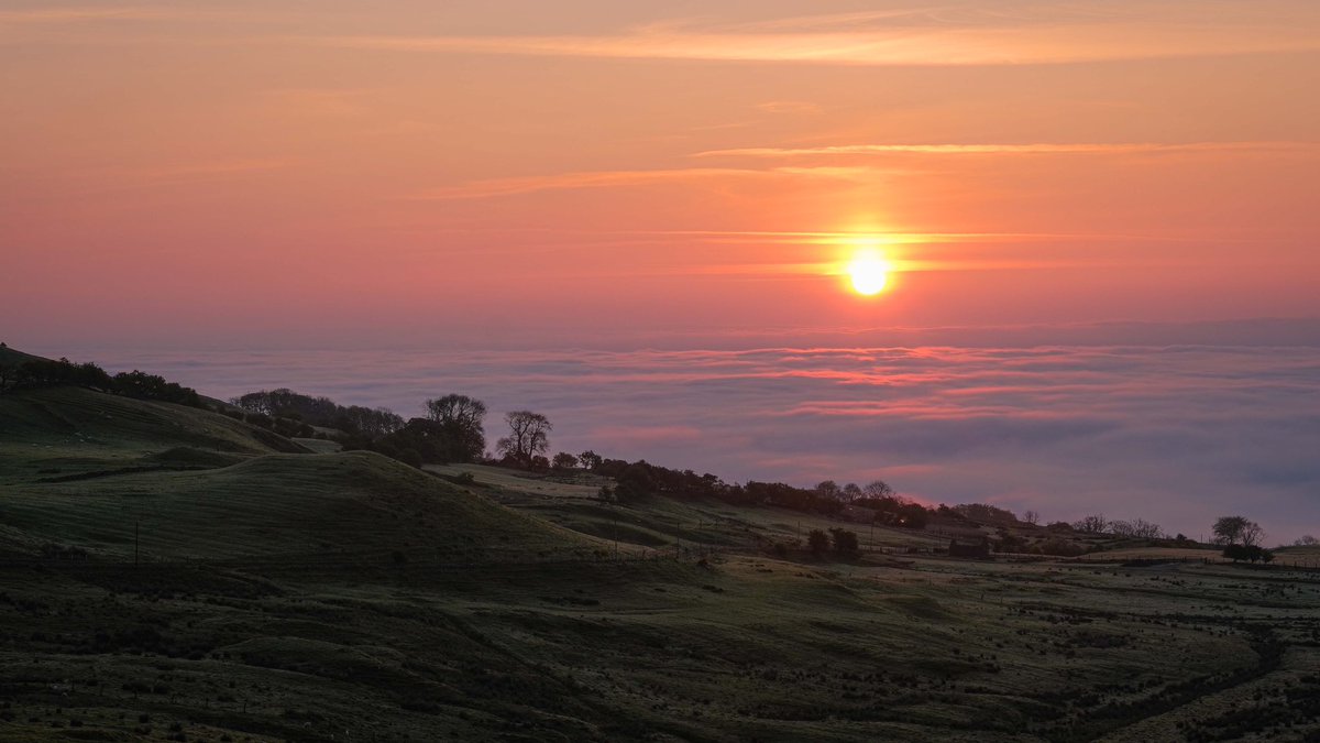 This morning’s amazing sunrise over a blanket of sea fog, from the hills above Ballygally, Co Antrim. #fujixt3 <a href="/barrabest/">Barra Best</a> <a href="/bbcniweather/">BBC NI Weather</a> <a href="/Louise_utv/">Louise Small</a> <a href="/WeatherAisling/">Aisling Creevey</a> <a href="/angie_weather/">angie phillips</a> <a href="/WeatherCee/">Cecilia Daly</a> <a href="/itvweather/">ITV Weather</a> <a href="/FujifilmUK/">FUJIFILM UK & Ireland</a> <a href="/ILoveLarne/">I Love Larne</a>