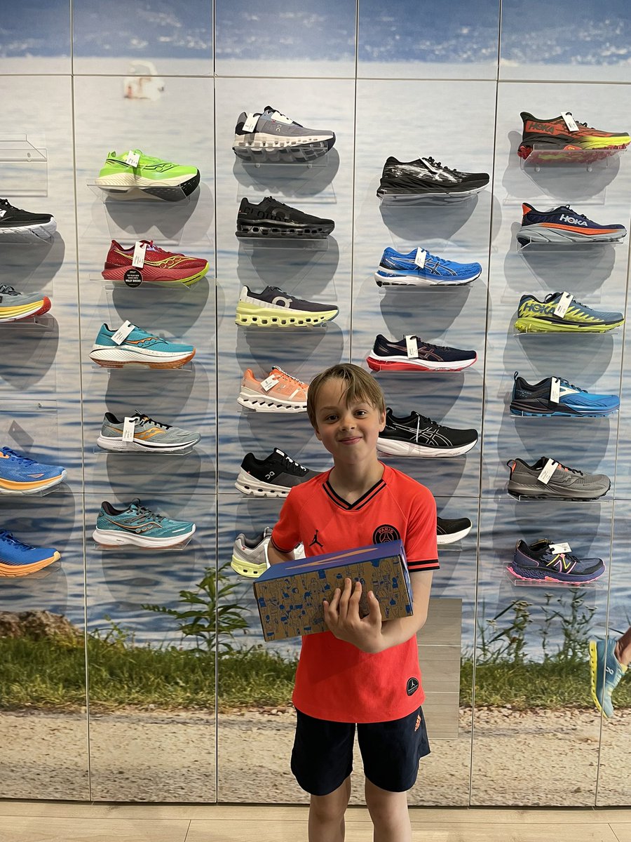 AdamMoran's tweet photo. Spending the @ManAreaXC raffle winnings. Big thanks to @RunnorthwestRun Ted is over the moon with his first proper running trainers. Another pair of @brooksrunning in the house :) https://t.co/CYa0z1F03k