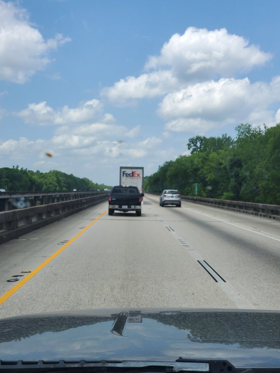 Pamirace's tweet photo. Hey  @FedEx, this is the atchafalaya basin bridge and trucks are only allowed to be in the right hand lane... Do better https://t.co/f8QAWoyqzZ