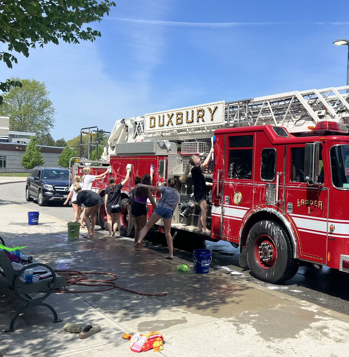 Duxbury firefighters couldn’t pass up the chance to help out the Duxbury girls golf team at their fundraiser today! Thanks for washing our ladder truck on this beautiful weekend. #DXFD members supporting the community who supports us!