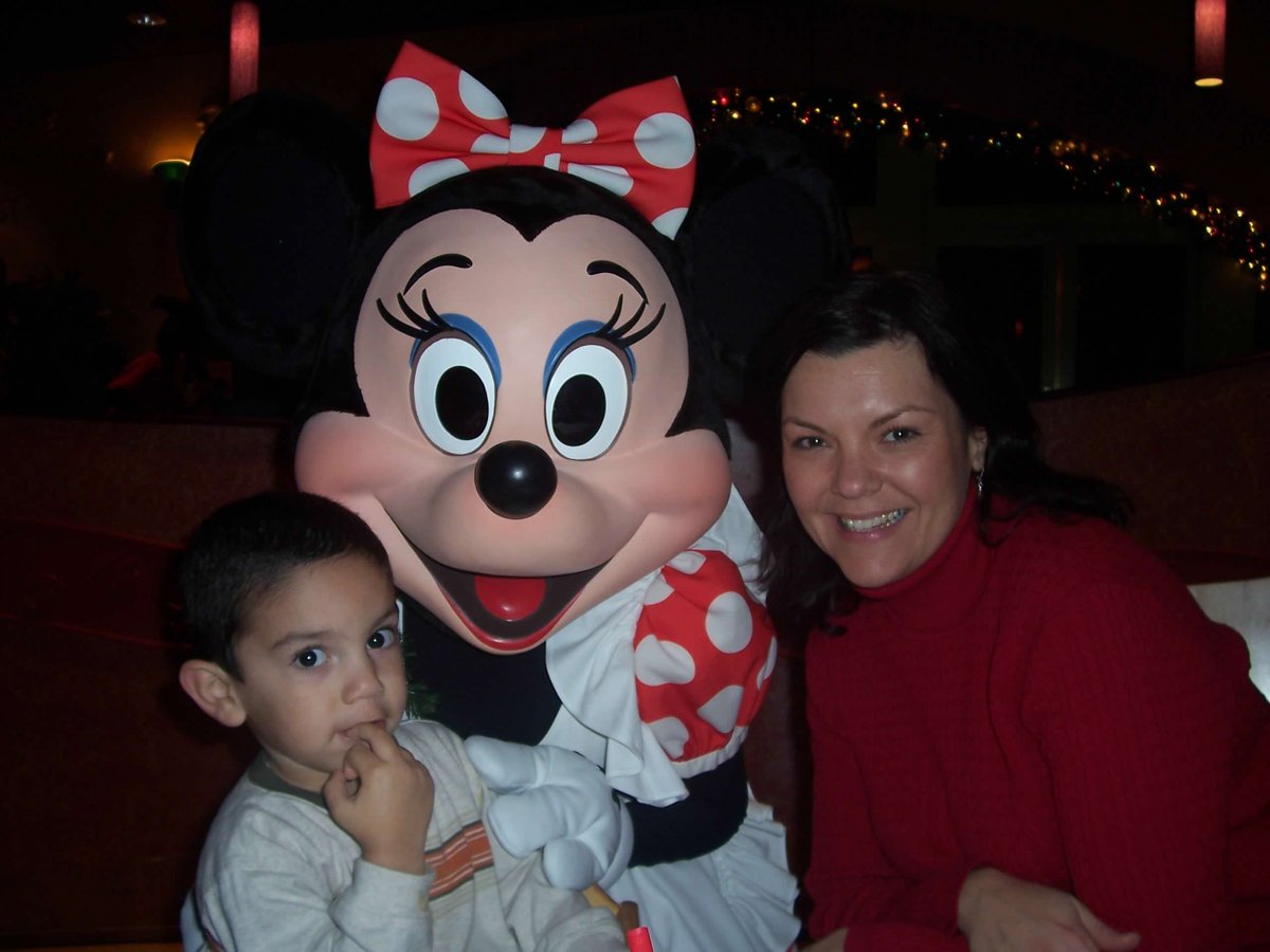 DisneyParks's tweet photo. This Mother’s Day, we’re shining the #DisneyCastLife spotlight on Gina! ✨ Her 30+ year Disney career gave her the opporTOONity to start a legacy spanning more than 3 decades! See how Gina and her family all worked together in Mickey’s Toontown: https://t.co/dPAbAD9DfA https://t.co/nNNywGkpDI