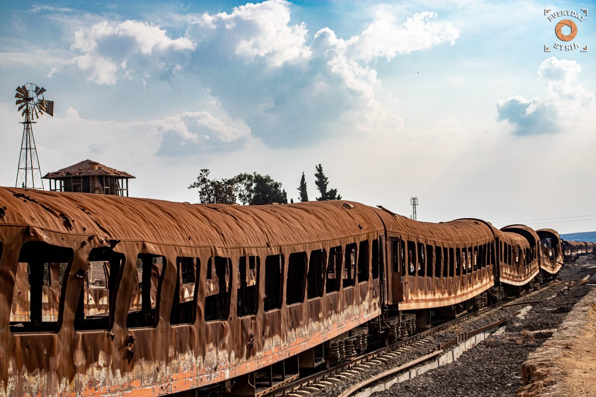 EverydaySyria's tweet photo. Rusted-out train cars are all that remains of the once-bustling train station in the Shahba region, north of Aleppo, which is now surrounded by Turkish-backed armed groups and Syrian government forces. https://t.co/Ins7bVgqUo