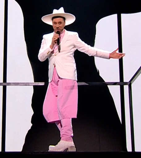 innocent's tweet image. Pharrell meets Curious George's Dad meets Cabaret. 

#Eurovision