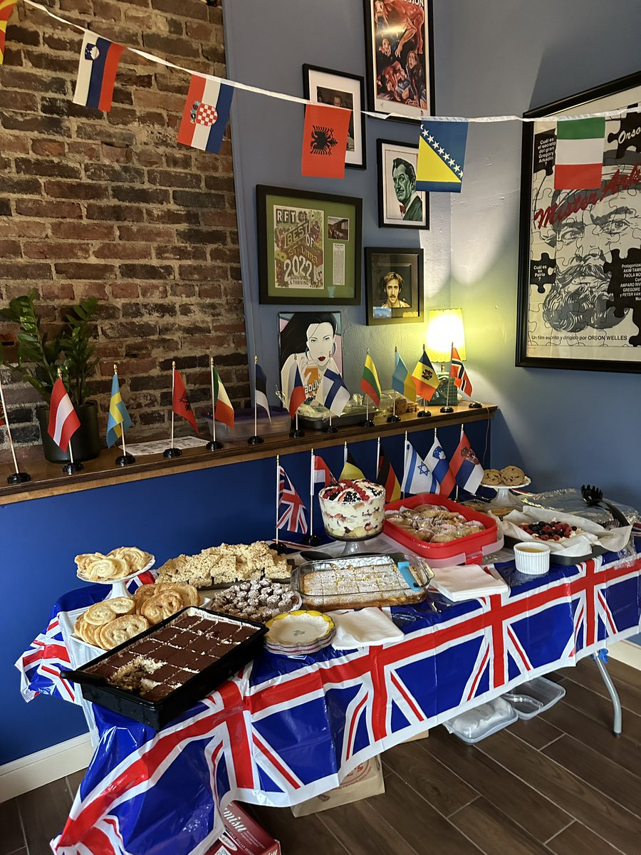 PodcastMonster's tweet photo. We’re doing Eurovision up right here in St. Louis! European-inspired dessert potluck… and spaghetti for some reason. #watchwithpeacock https://t.co/xDOii99tgU