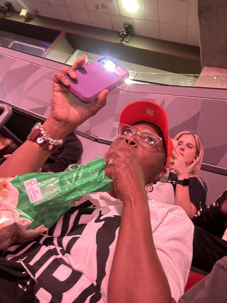 .@JullyBlack asked all mothers to turn on their flashlights at the @WNBA game.

I think mom nailed it while ALSO holding the popcorn!