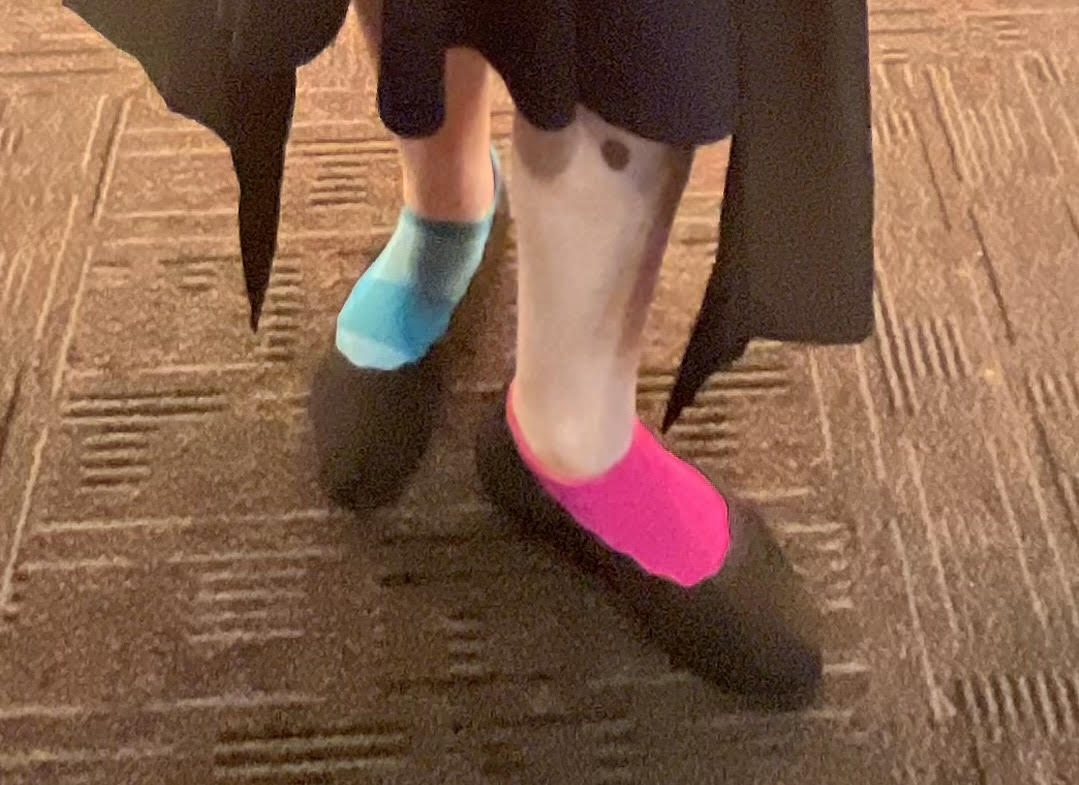 Subtly evoking the trans flag through the combination my only two clean socks and my white-ass legs