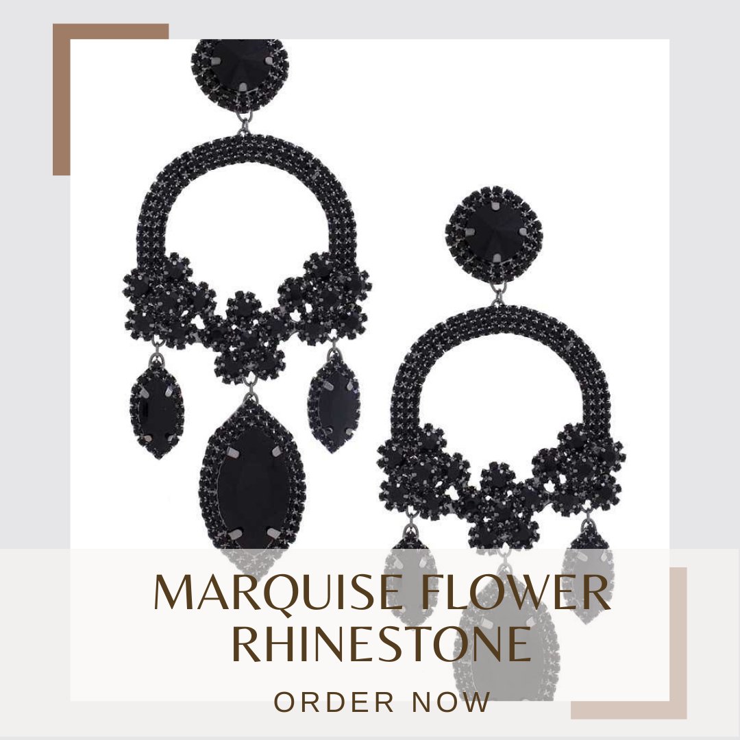 Make a statement with our exquisite Marquise Flower Rhinestone Dangle Earrings! These earrings feature an elegant flower design with marquise-shaped rhinestones that sparkle with every movement. 
#rhinestoneearrings #flowerdesign #marquise #dangleearrings 
thewomansstore.com/Marquise-Flowe…