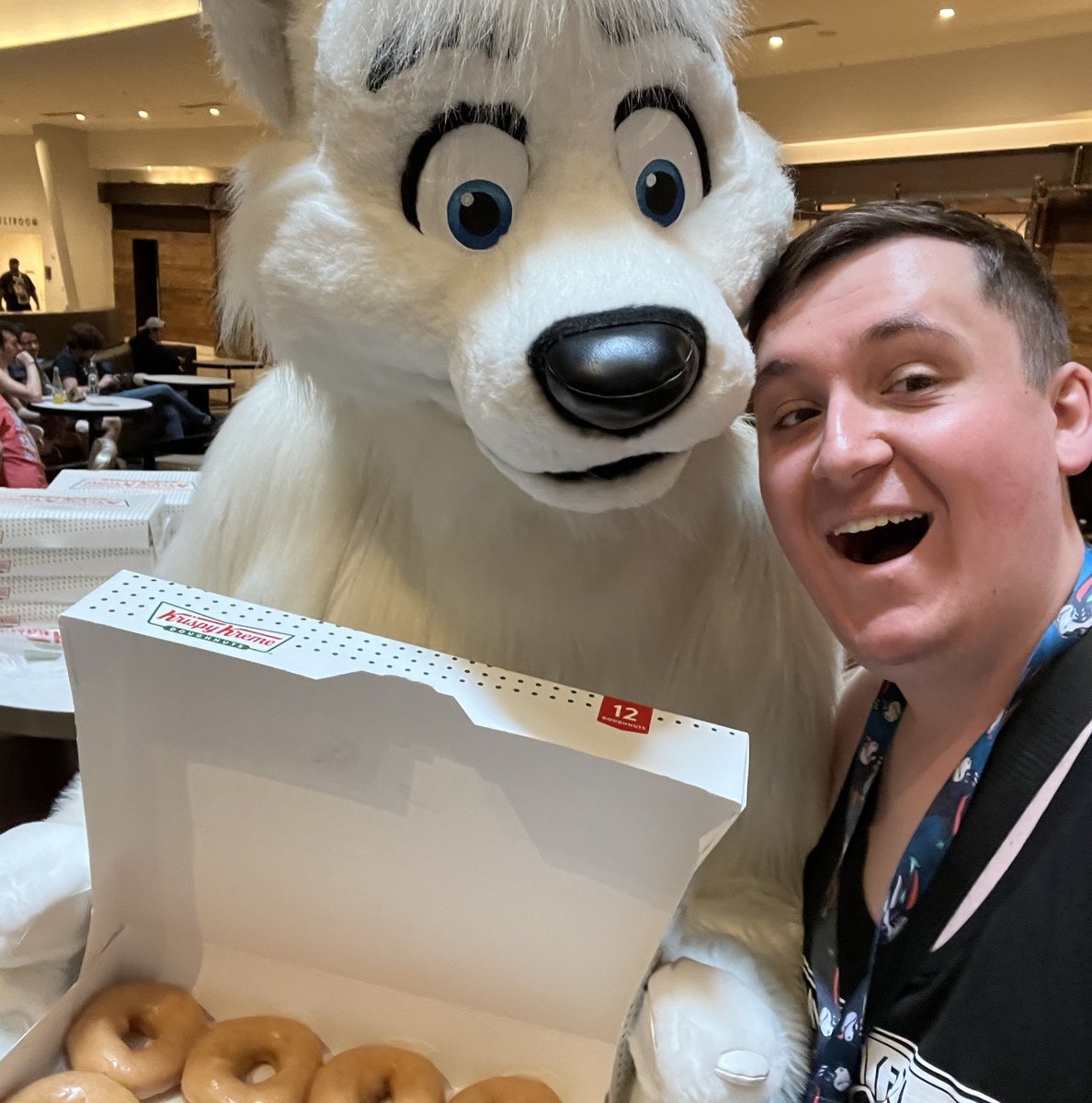 BetaEtaDelota's tweet photo. There was a cute dog giving out Krispy Kreme donuts and I just HAD to get a picture with him! 

(If you know who this donut dog fursuiter is PLEASE let me know!) https://t.co/4fVrxr0HSR