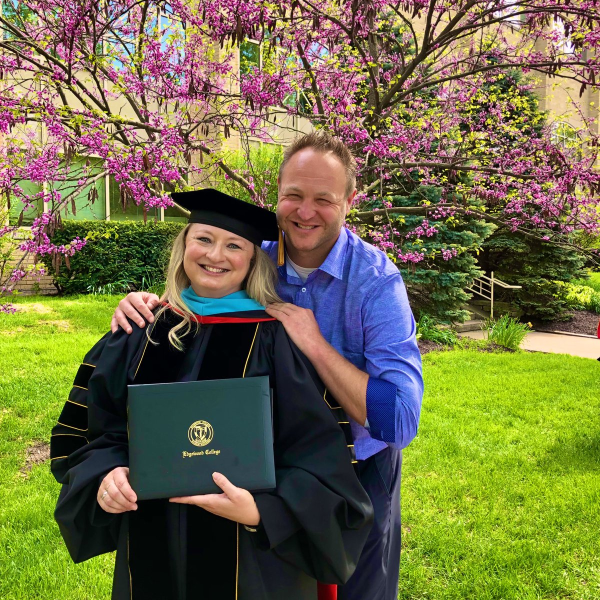 CoachHockett's tweet photo. Wife, Mother, Daughter…   Dr. 🎓 

Words can’t express how proud we are of @PE_MammaHock ❤️ She did it!!! 

👩‍🎓 #OfficiallyDrHockett 👩‍🎓 https://t.co/Fj4RxnHmy1