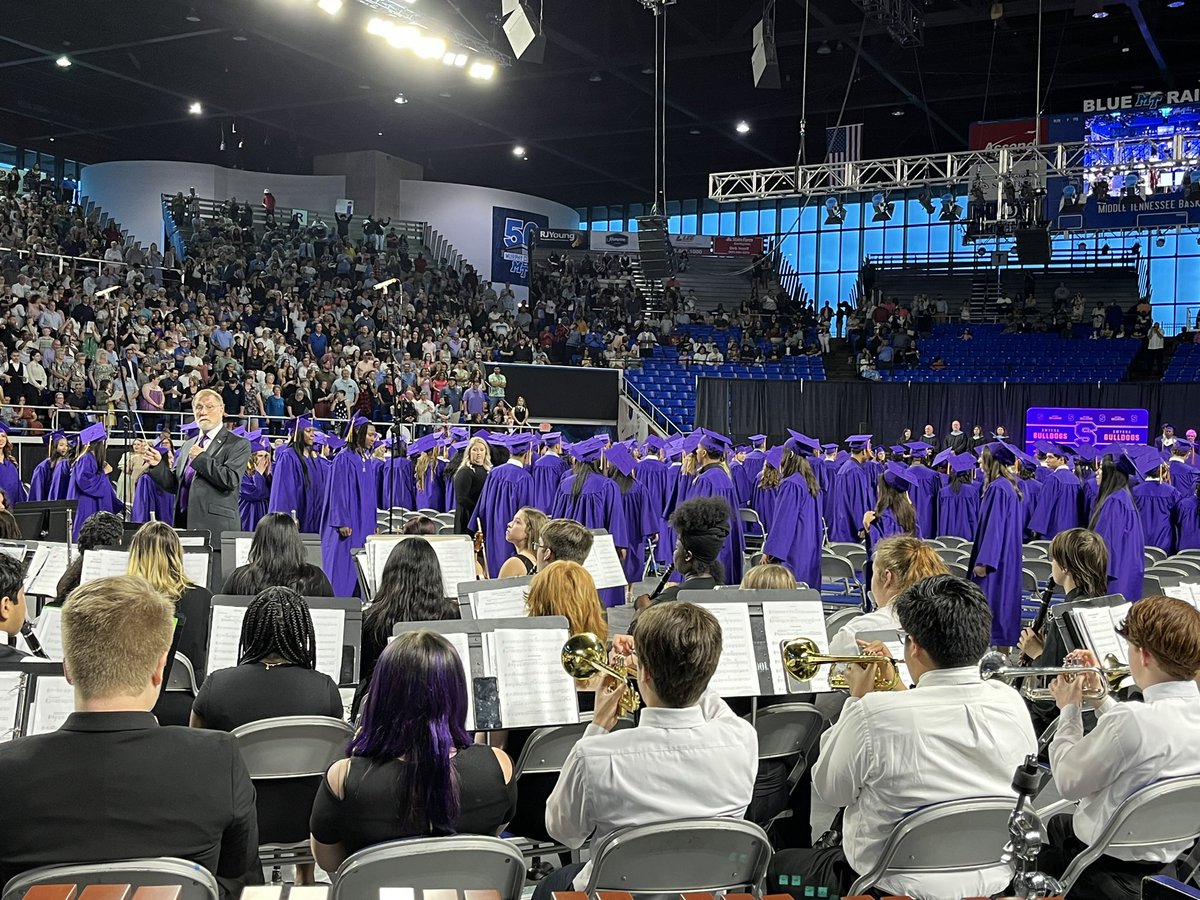 smyrnahighband's tweet photo. From marching in to Pomp &amp; Circumstance 🎶 to the traditional hat toss at the end. 🎓 What a great graduation ceremony we had today!  Congratulations class of 2023!!!  💜💛 #onlyoneshs @SmyrnaBulldog https://t.co/4Z4xg8JiuP