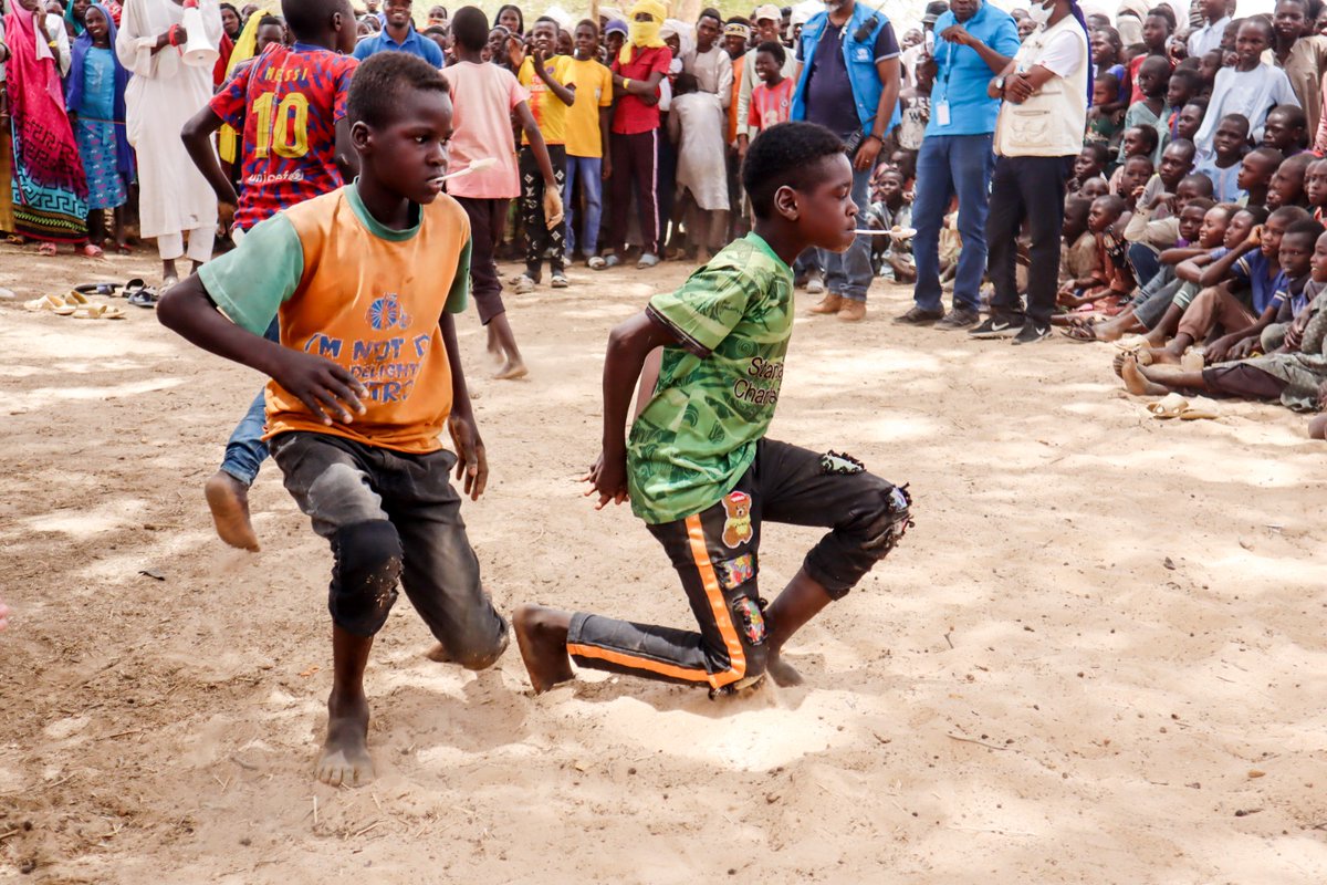 EduCannotWait's tweet photo. #ECW's mission delegation watched uplifting activities for children at a temporary safe space in #Borota, where #NGOs provide #MHPSS💚through playful activities.
Heartwarming to see how simple, fun games can bring joy+laughter amid incredible hardship & suffering. @UN @ONUTchad https://t.co/5S0DmhhI8t