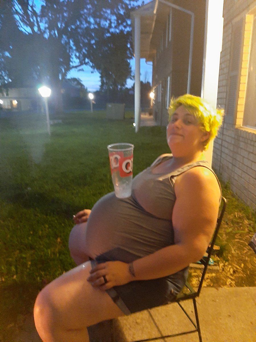 I am very bloated and look terrible but I am also 9 months pregnant. Baby Mark is helping hold my ice cup. Lol