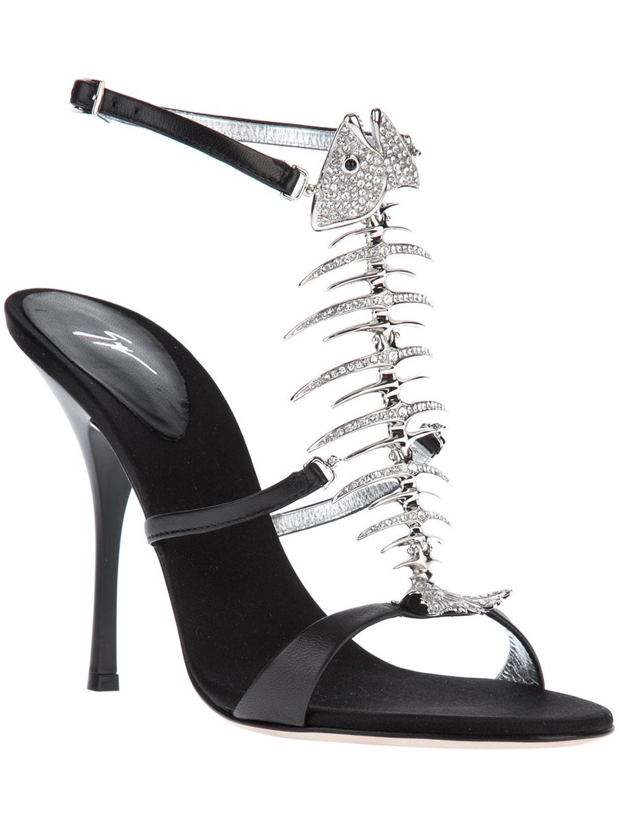 Samantha covered in sushi wearing Zanotti fishbone sandals