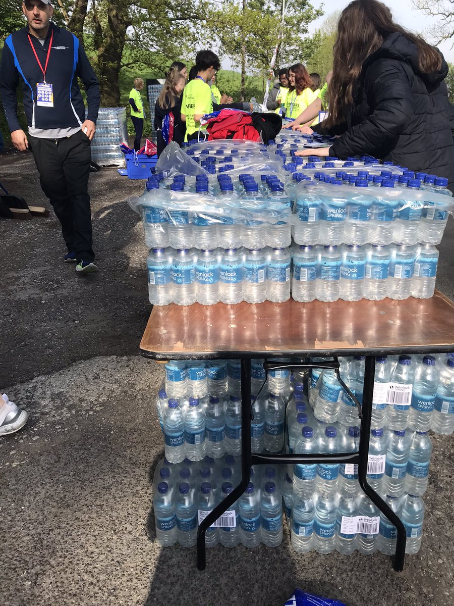 Beth_HalifaxUK's tweet photo. All set up at drinks station no. 6 for Rob Burrow Leeds Marathon @runforall #RunForAMateWithAMate #RunforRob https://t.co/xUBjKWJ3sk