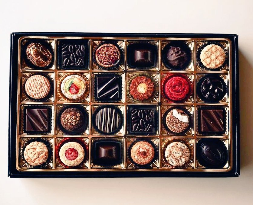 womensart1's tweet photo. Japanese textile artist Ipnot's 'culinary embroidery', 'chocolates'. Often her work has staging and moveable parts #WomensArt https://t.co/6xrFtPktEC