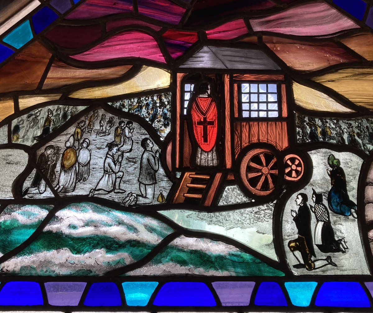 This beautiful Stained glass shows a remarkable scene from 1852- a Catholic mass taking place on the beach! The priest in a box on wheels, while people kneel in the wet sand! Such was reality in Kilbaha, where landlords had refused to allow the building of a church anywhere on