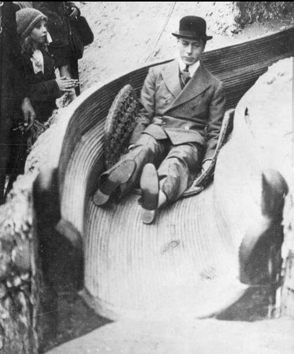 King George VI of Great Britain on a slide at the Wembley exhibition, England, 1925.