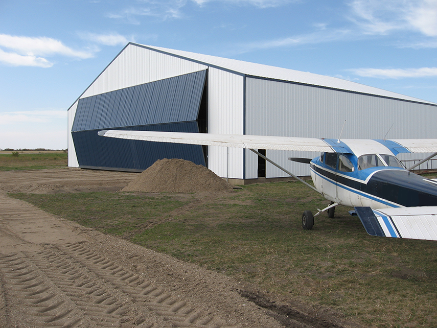 If your hangar is home to a single engine Cessna or Bonanza V35 you will need 40-50ft of clearance for the wingspan.

Diamond Doors custom-makes doors for each project and can accommodate any wingspan size and building requirements. 

#DiamondDoors #avgeek #avdaily