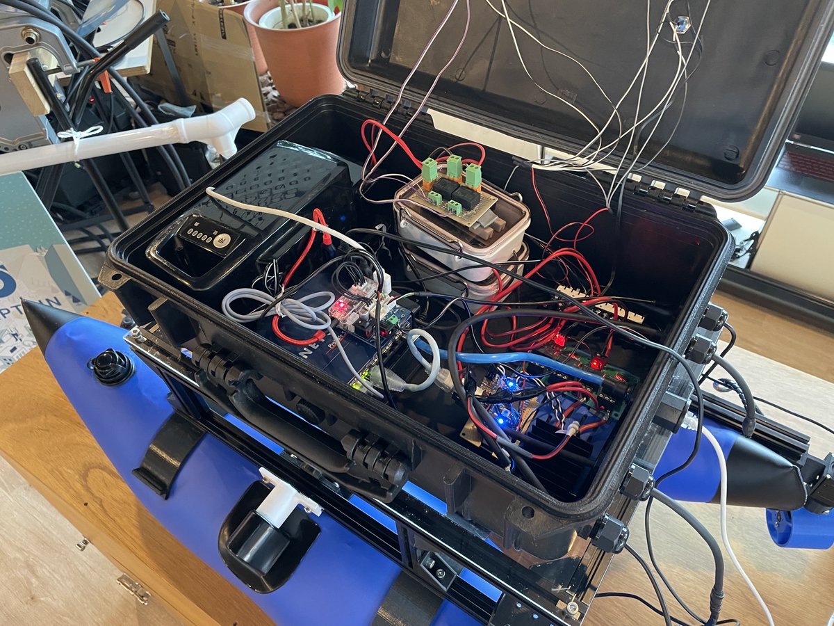 kuwamai's tweet photo. OUXT Polarisさんの自動航行船コンテストMaritime Robotx Challengeに使用している開発機が展示されてました。本物は自動車くらいのサイズで開発が大変なので、本物と同じセンサ構成、通信プロトコルの開発機を製作したとのこと。防水Dynamixelかっこいい。
#ROSRobotParty #rosjp https://t.co/Fc4t4vmg1a