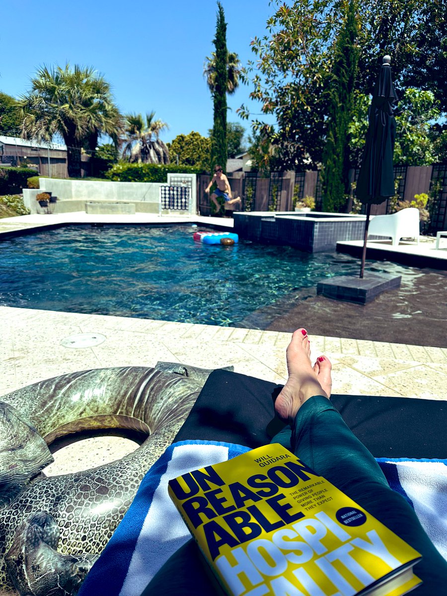 Mother’s Day by the pool, with one dude swimming, a deflated T-Rex floatie, and a new book. Enjoy your day, mamas!