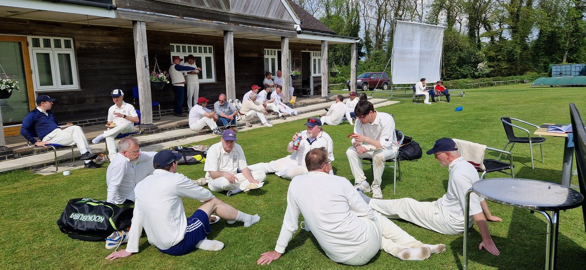The sun is out at Great Tew and the teams are enjoying tea sur l'herbe. Bodleian, batting first, close their innings at 152 for 8 off 35 overs.