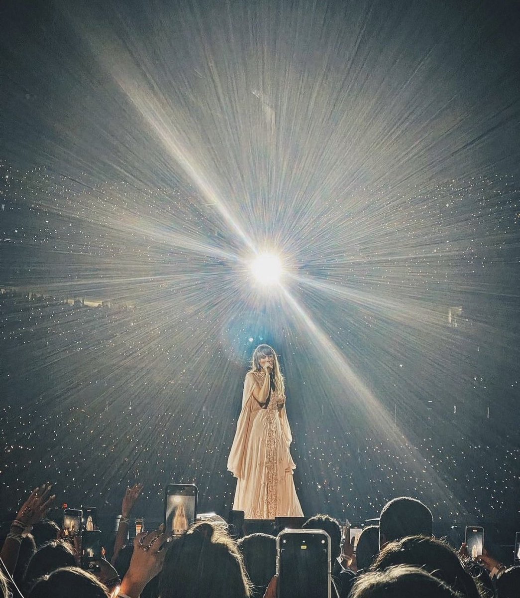 whoever took this photo really captured the energy of the eras tour so perfectly