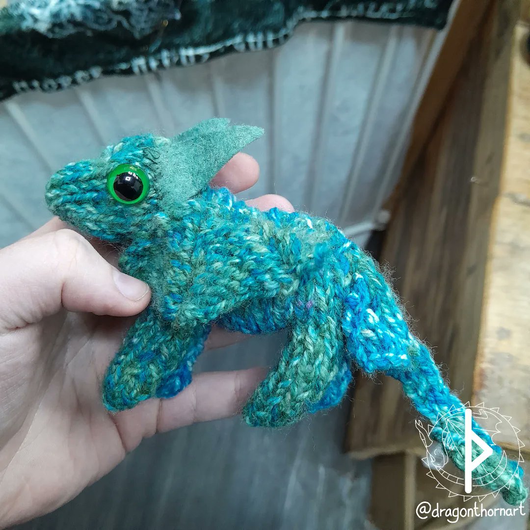 dragonthornart's tweet photo. Another little knitted dragon complete, this time a bluey-green one.

All I seem to be doing at the moment is working and knitting 😂

This dragon kind of reminds me of Earth with the blues and greens.

#knitting #knitteddragon #handmade #handmadedragon #dragon #dragontoy https://t.co/3U3tyyTvhi