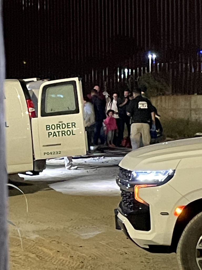 LoriSaldanaSD's tweet photo. Here's what's been happening to applicants for asylum at the US/Mexico border after #Title42ends :
- Applicants who ask for asylum at the border crossings are transferred to open-air dirt lots in the zone between the #Tijuana #SanDiego border fences,
- They have no access to electricity, medical care, food, running water, or toilets except what's provided by volunteers doing humanitarian assistance
While held in these fenced dirt lots:
- People are told to apply for asylum via an app created by @cbp using their mobile phones- but the system has been overloaded & crashing, and/or reception in the border zone is limited
- Armed CBP agents patrol the detainment areas, riding on 4-wheelers or driving vans & SUVs
-These vehicles kick up dust and debris near unsheltered older adults, pregnant women, and families w/babies & young children
As names come up for processing to the next stage:
- Armed agents arrive in the middle of the night and awaken the group of 100s of people to should names and take away a few dozen people at a time "processing"
- Out of view of the others, armed male agents conduct searches & hands-on body inspections of women as well as men, in front of their children