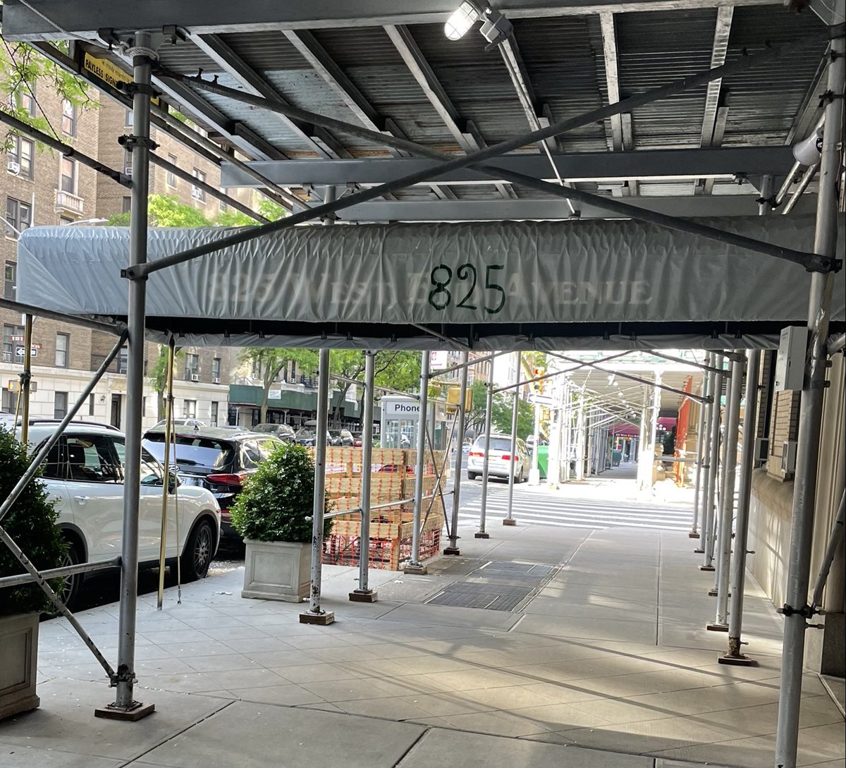 In my neighborhood, many buildings cover their awnings when scaffolding goes up, and the temporary address numbers that appear are much more interesting than the ones they cover up