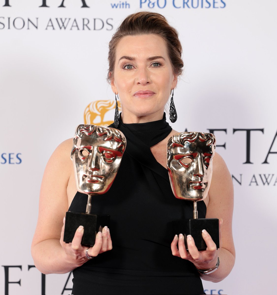 Kate Winslet and her awards for #BAFTATVAwards for drama I Am Ruth.

She also thanked her daughter Mia Threapleton who starred alongside her.