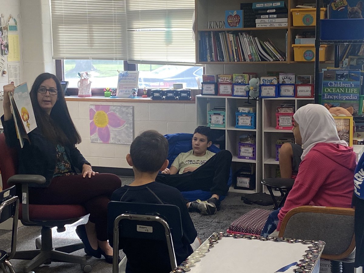 Today we had a very special guest reader. Loved listening to Ms. Kelly read A New Day.