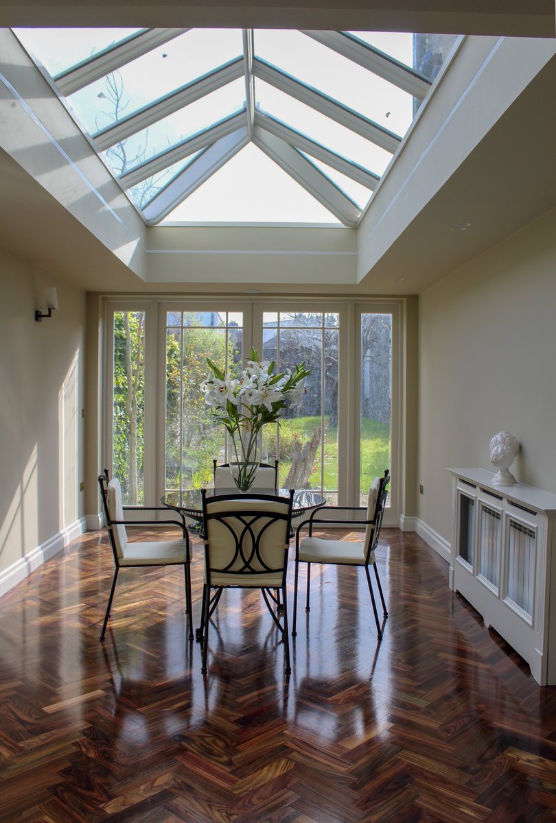 A very beautiful dining extension for this property in Dublin with timber rooflight and French doors by Timeless Sash Windows.