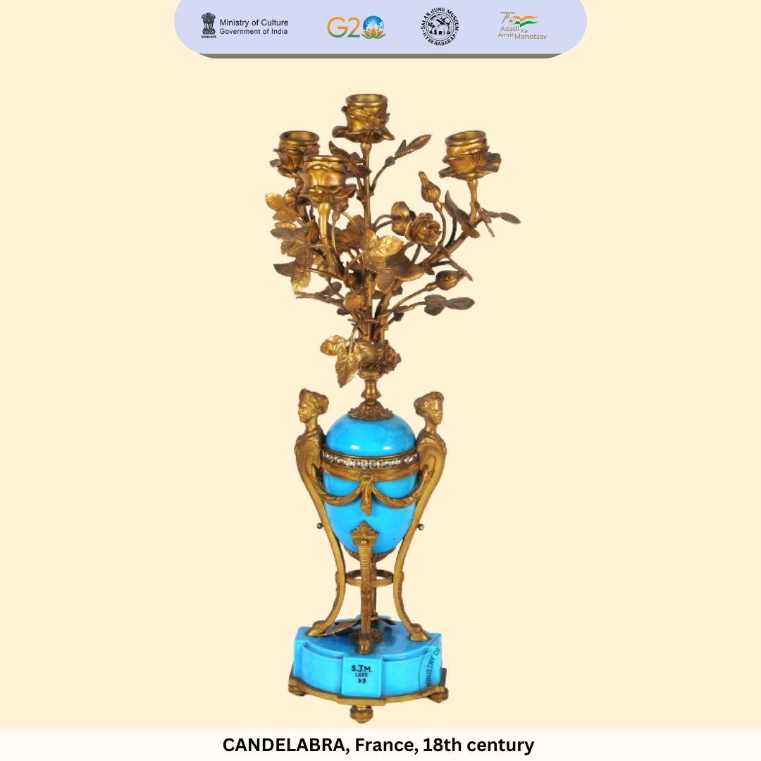sjmhyd's tweet image. Check out this blue porcelain brass candelabra from France, dated 18th century. It has space for four candles. The candelabra is supported by two caryatid figures holding it together with their joined hands. 
#SalarJungMuseum #AmritMahotsav #candelabra
