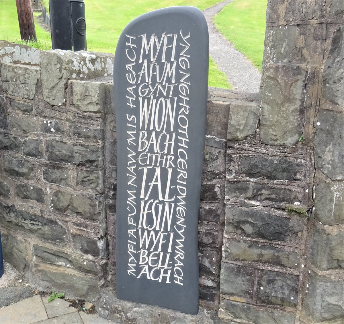 This stone in Llanfaircaereinion, where the boy Gwion Bach stirred the cauldron for Cerridwen before being transformed into Taliesin, reads 'I who was once Gwion Bach, am instead Taliesin...'