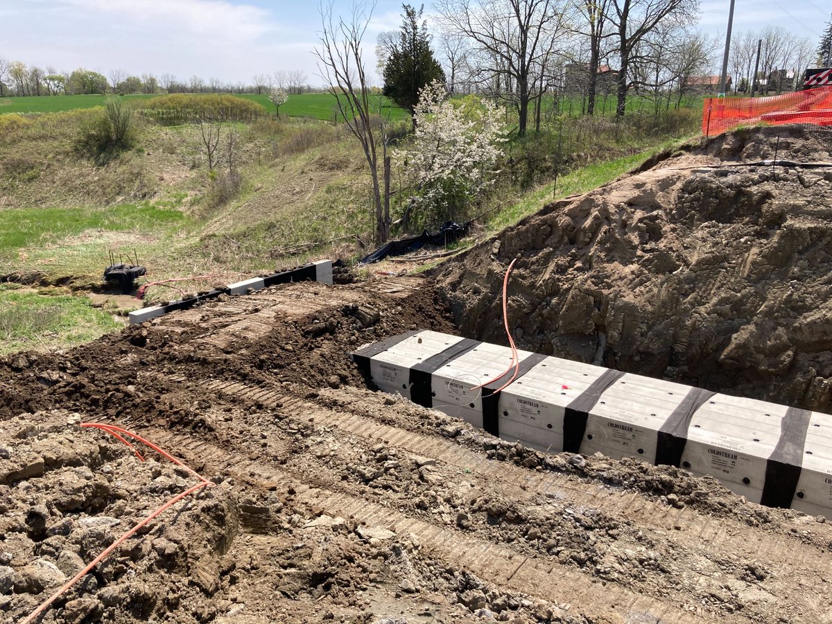Coldstream_45's tweet photo. Another box culvert hitting the ground approximately 7m under Nauvoo Road North of Alvinston, Ontario. Cope Construction installed this culvert over 2 days and had already begun backfilling on day 2. 
#AcceleratedConstruction #BoxCulvert #Precast #PrecastConcrete #Construction https://t.co/sV1qwo0chd