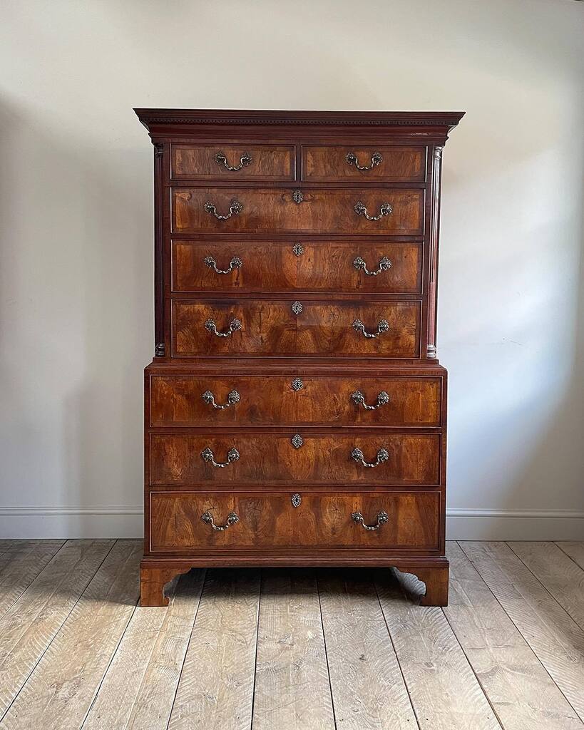 Now this is something really special: Magnificent early Georgian walnut chest on chest. Dentil cornice over two short and six long crossbanded drawers with matched veneers of exceptional colour and figure, and fitted with the original decorative brass ha… instagr.am/p/CsRY0v_oGp3/
