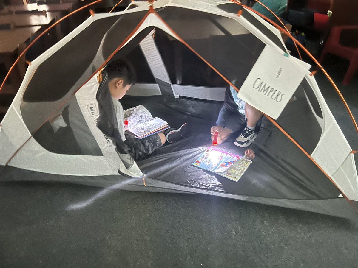 library_spencer's tweet photo. Camp Read-a-Lot is open for business! 🌲⛺️🔦📚 @MISDLibServ #MISDliblove @SpencerBroncos https://t.co/XI98TIfSE4