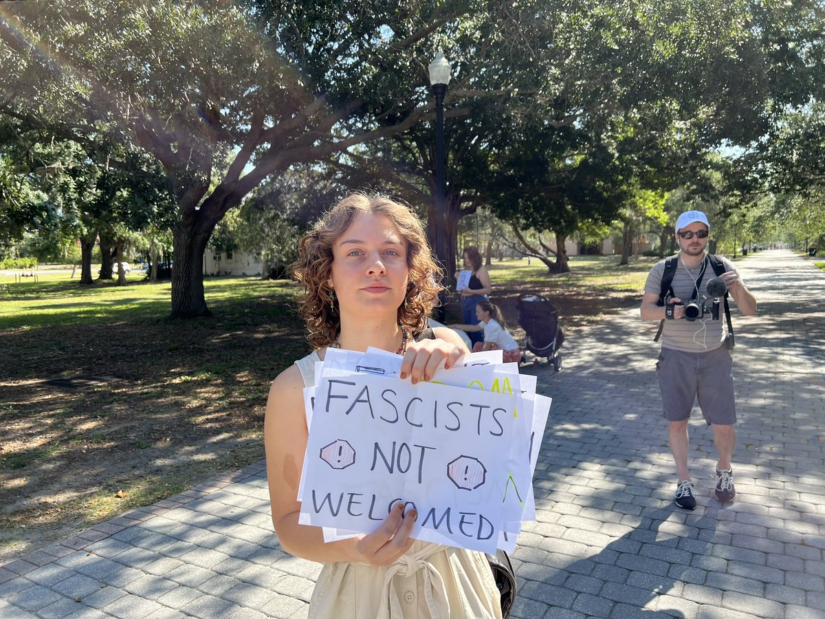 zacjanderson's tweet photo. New College students and alums protesting Gov Ron DeSantis visit to campus today https://t.co/t6v0fosONr