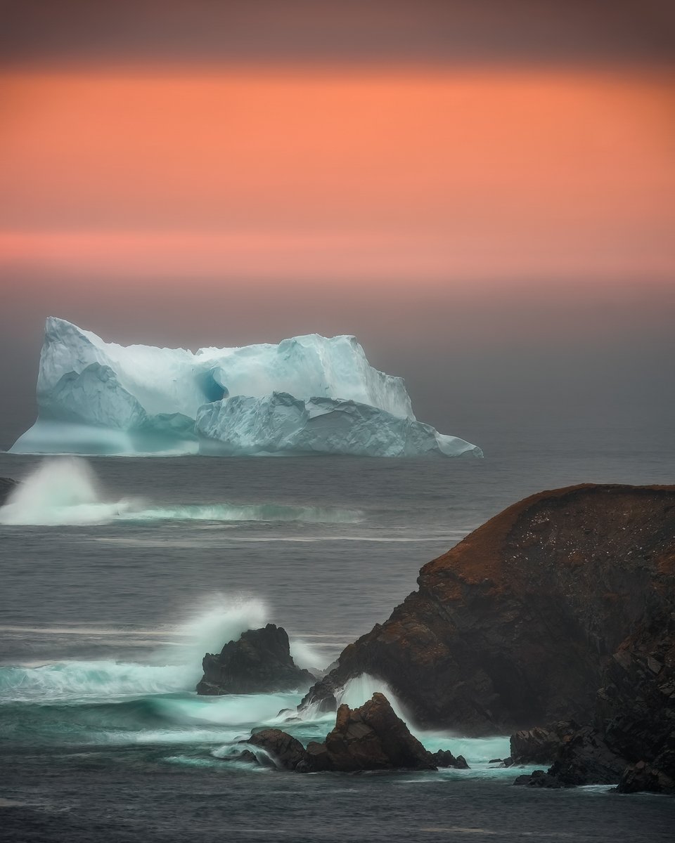 On the first dawn of the Ferryland Iceberg's grounding, a mist blanketed the ocean.  One of the interesting aspects of photographing icebergs is how they change over time and how different they can be from various angles. Throw in some changing conditions and different times of
